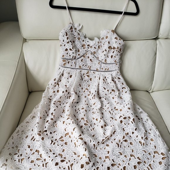 Sans Souci Dresses & Skirts - 2/40$ - White crochet style dress. Gorgeous !